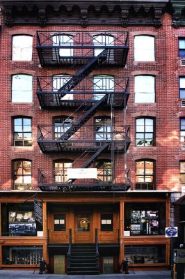 Figure 1: The exterior of the Lower East Side Tenement Museum. The building was constructed using cheap materials and many apartments had no running water.<br />
(Image: Fletcher6, Creative Commons, 2012).
